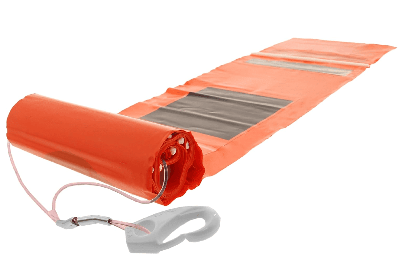 See Rescue Streamer - Be Seen, Be Rescued water rescue device unrolled with reflective panels and clip for emergency visibility.
