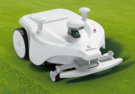 FJDynamics Titan robotic mower on green grass field